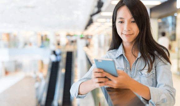 Customer using mobile phone for faster payment